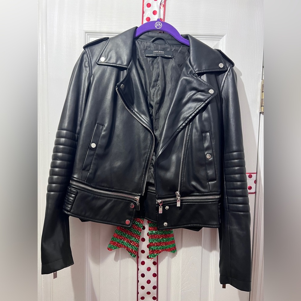 Black faux leather moto jacket.